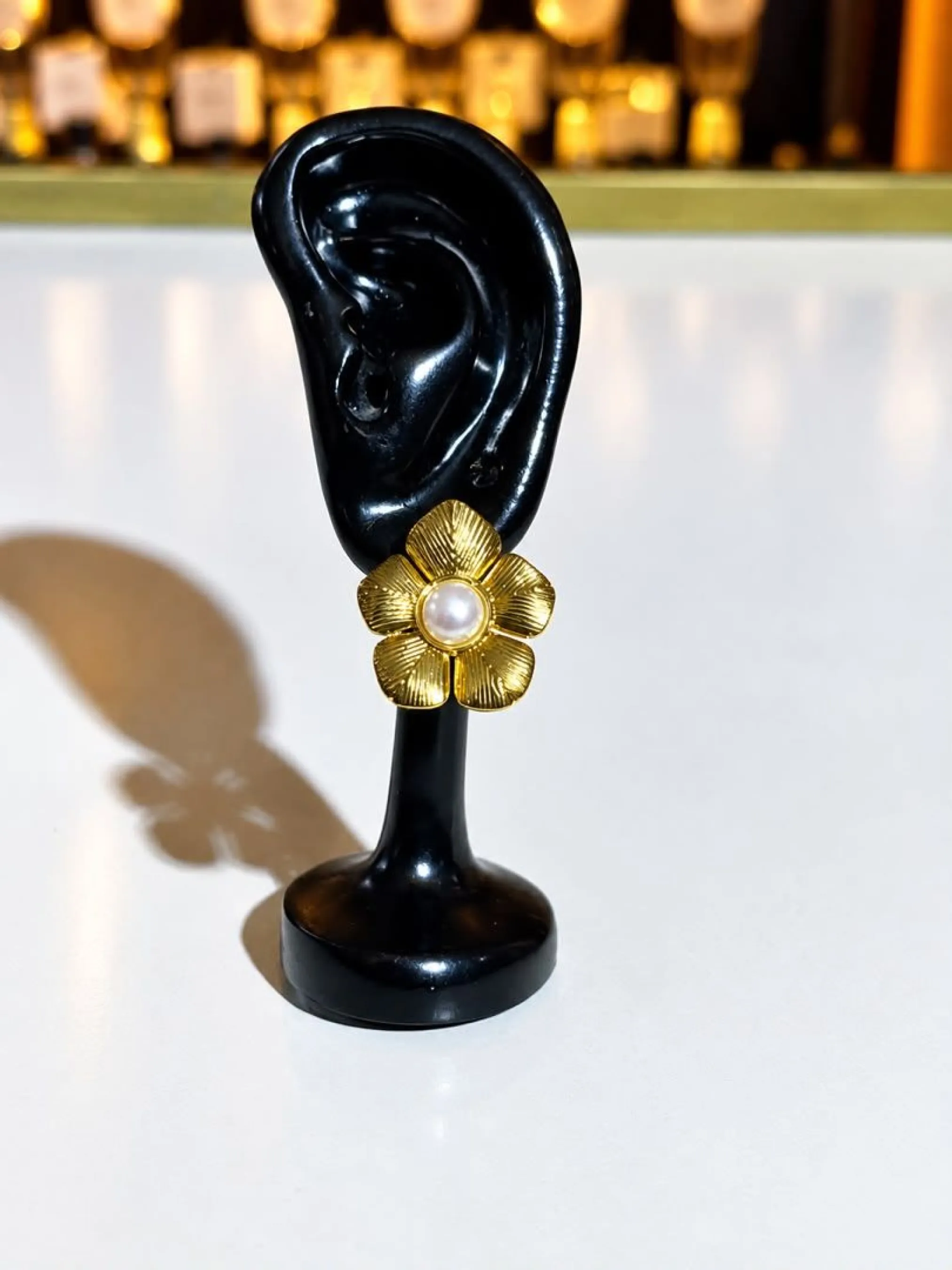 Boucle d'oreille pétale rose