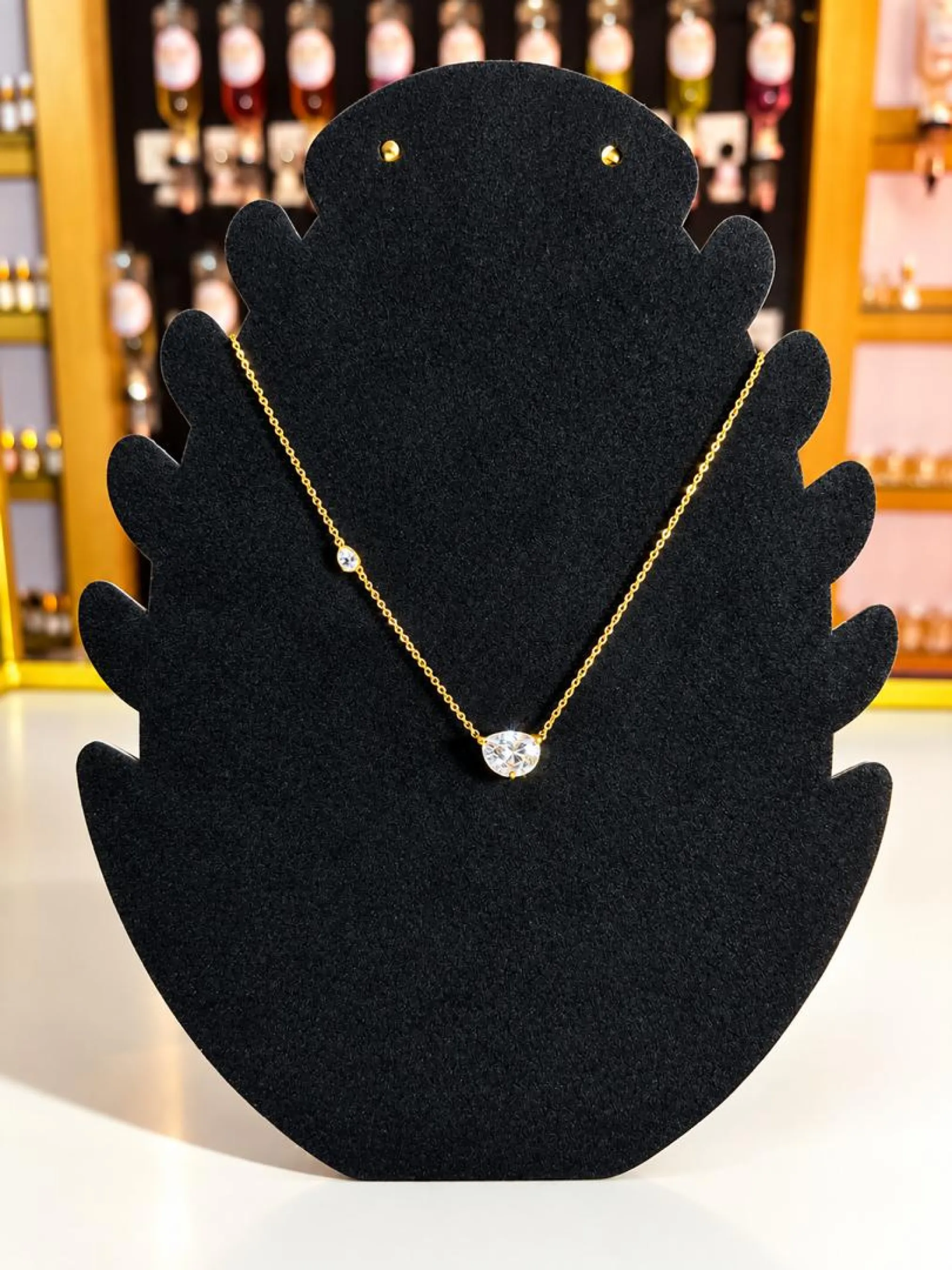 Collier doré pierres précieuses