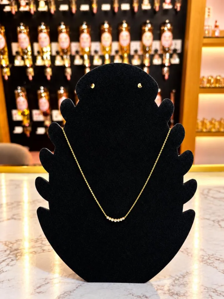 Collier doré barre incurvée