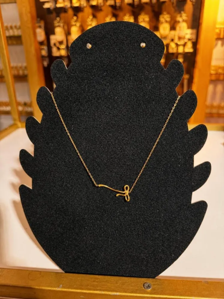 Collier noeud asymétrique doré