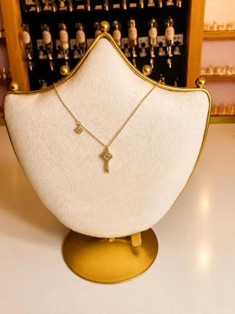Collier clé cristal